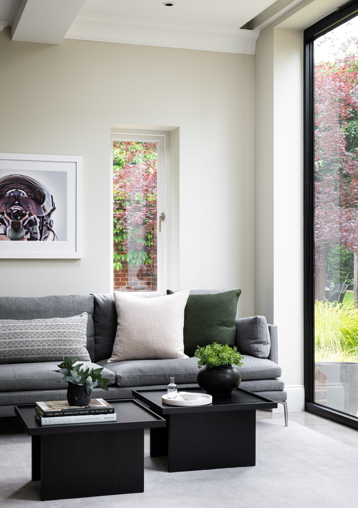Tasked with updating the large family home, we opened up exterior and interior walls to maximise light and garden views – the interiors sat against a neutral backdrop and included many bespoke furniture pieces, a walnut and stone kitchen and some great artwork