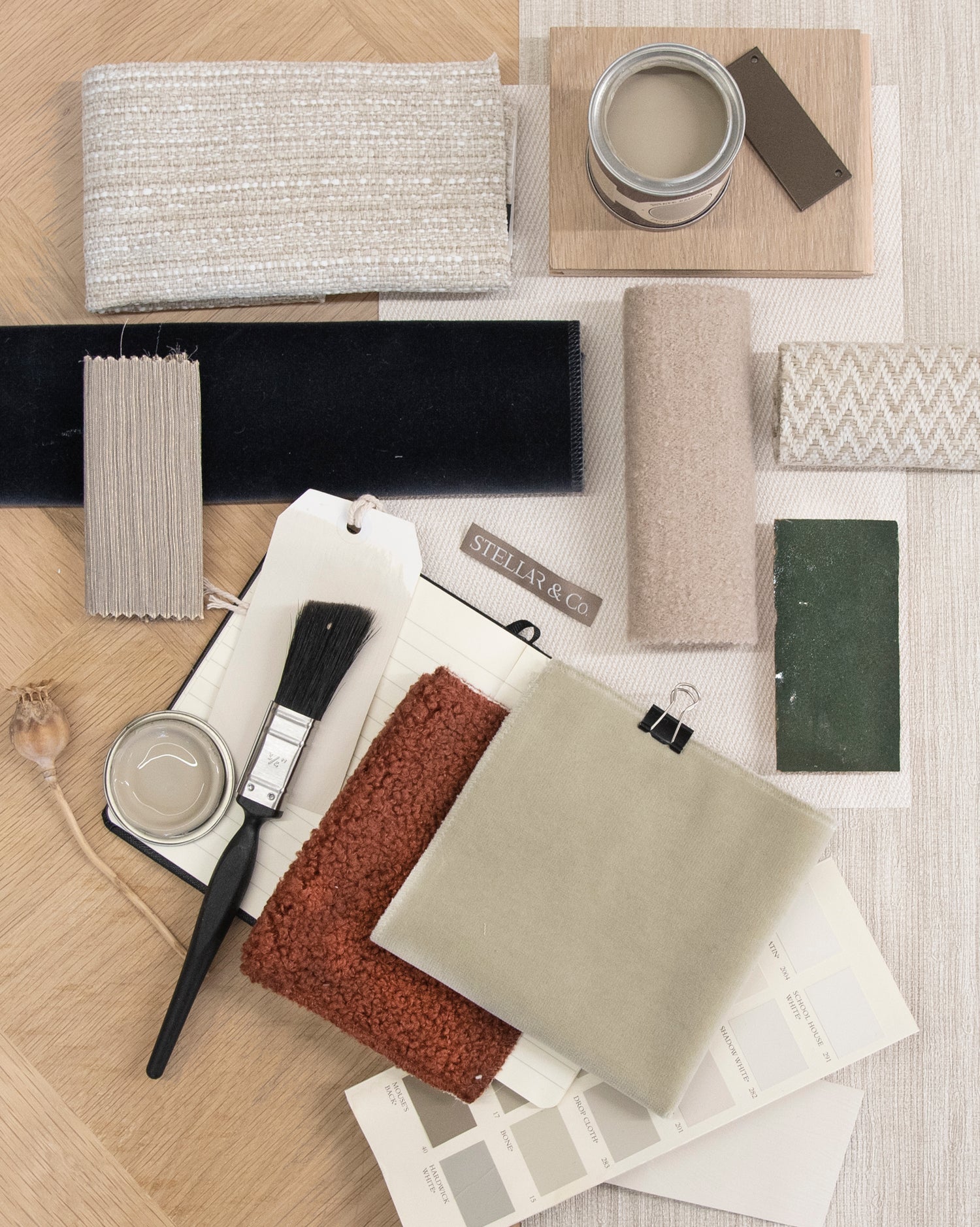 Interior designer presenting mood boards and fabric swatches, illustrating Stellar & Co's conceptual design process